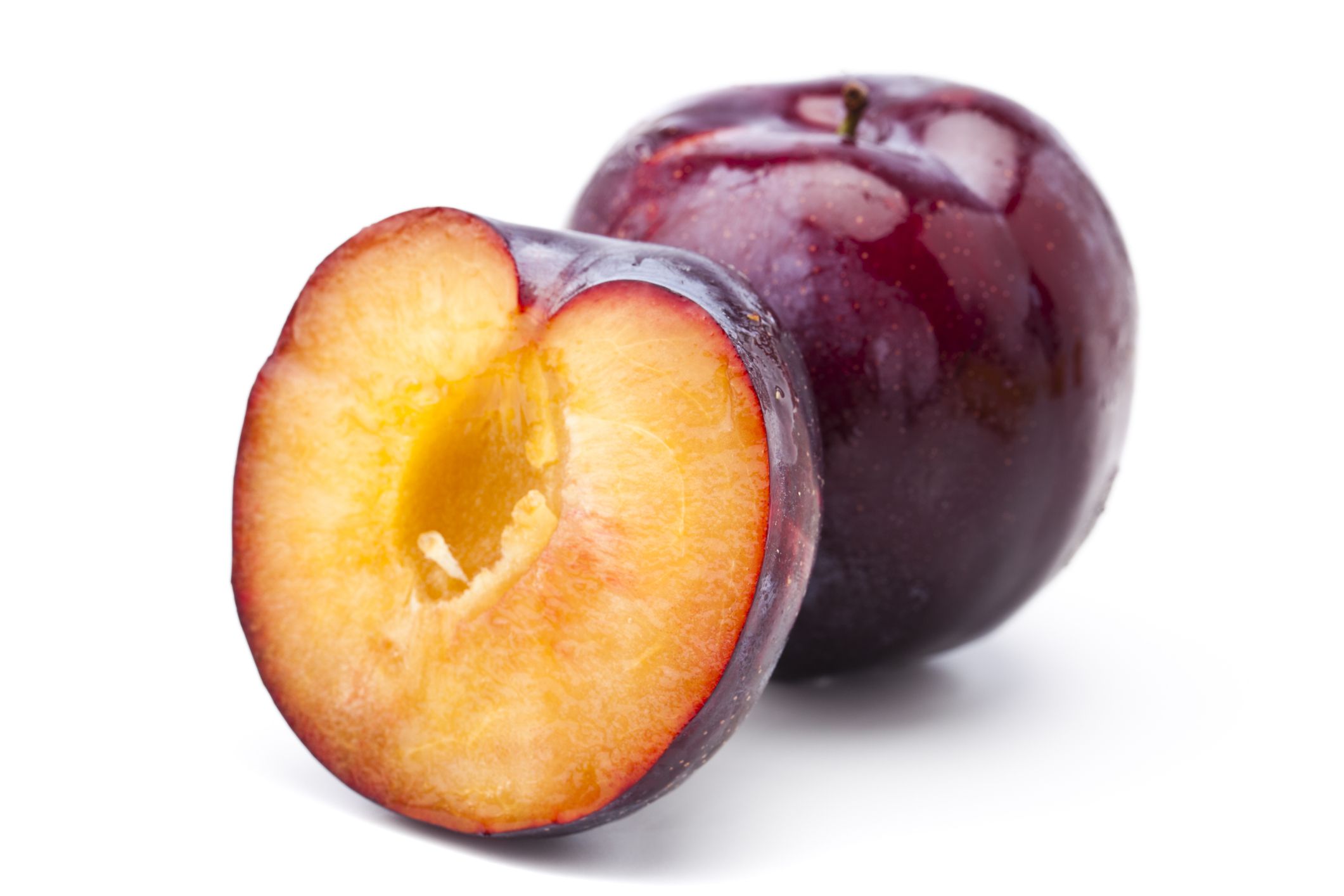Plum cut in half